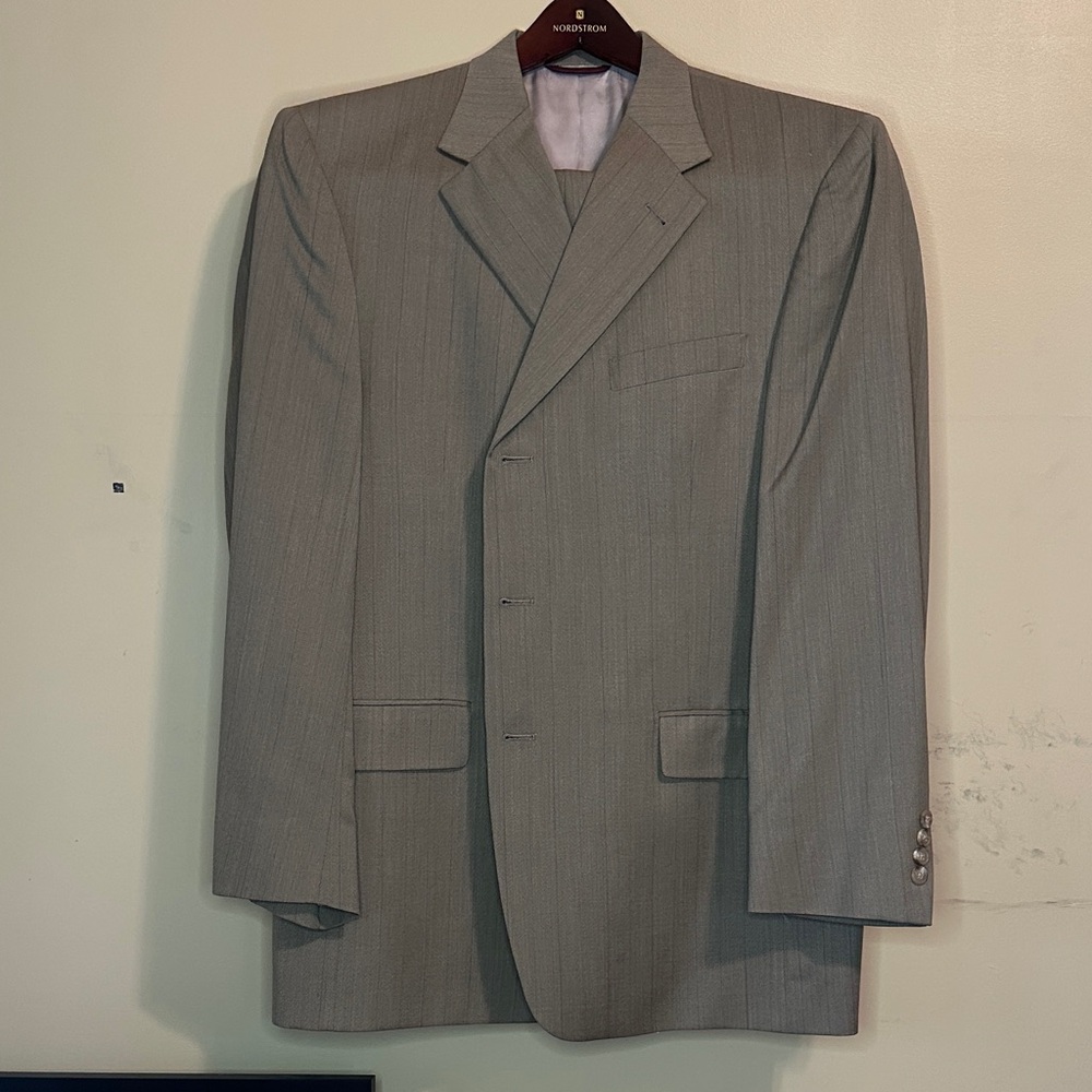 Men’s tan suit with grey stripe